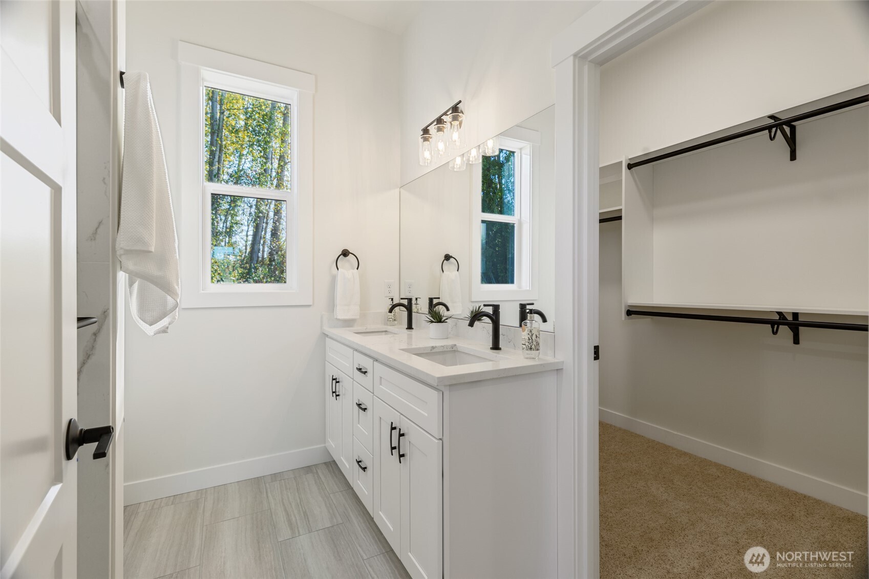 1354 Huntley Road Bellingham, WA 98226 - Photo 18 of 40 a bathroom with a sink a mirror and shower