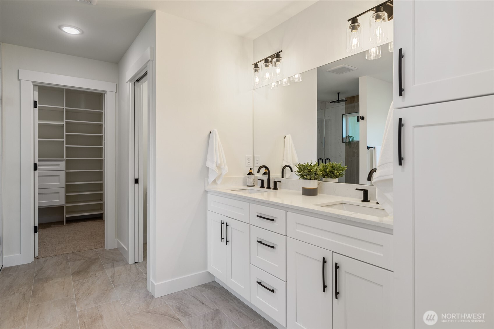 1354 Huntley Road Bellingham, WA 98226 - Photo 23 of 40 a bathroom with a double vanity sink mirror and