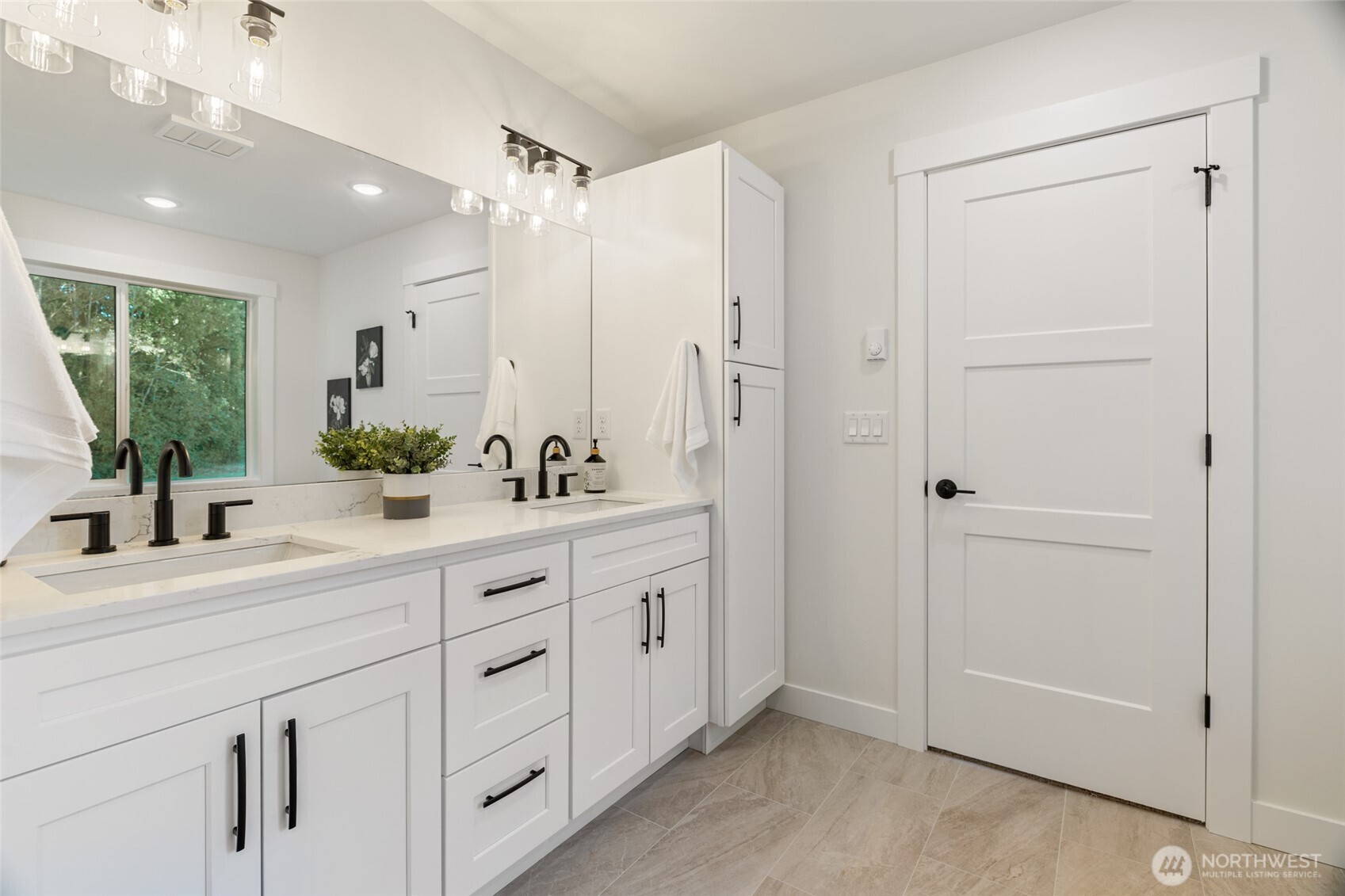 1354 Huntley Road Bellingham, WA 98226 - Photo 24 of 40 a bathroom with a double vanity sink mirror and shower