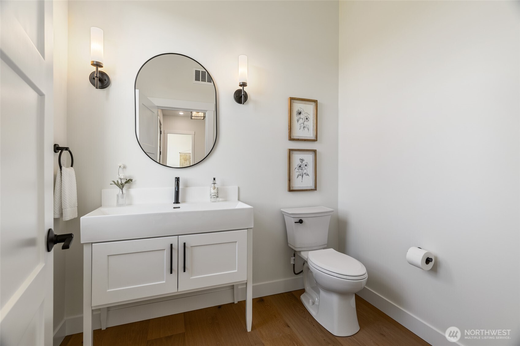 1354 Huntley Road Bellingham, WA 98226 - Photo 7 of 40 a bathroom with a toilet sink and mirror