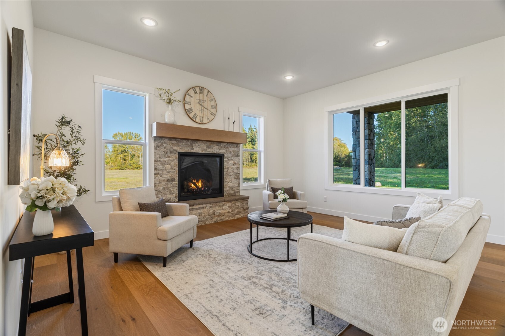 1354 Huntley Road Bellingham, WA 98226 - Photo 8 of 40 a living room with furniture and a fireplace