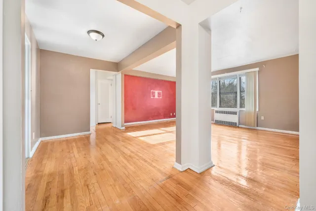 a view of an empty room and window