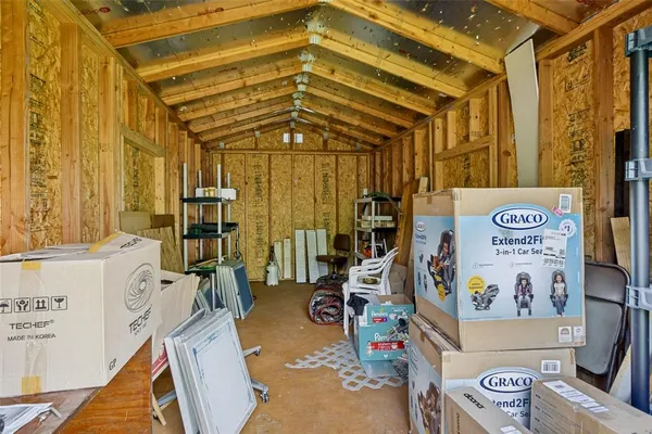 a front view of house with yard and trees