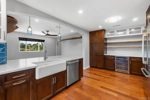 a view of kitchen and windows