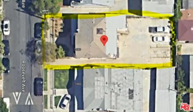 a view of swimming pool with sitting area