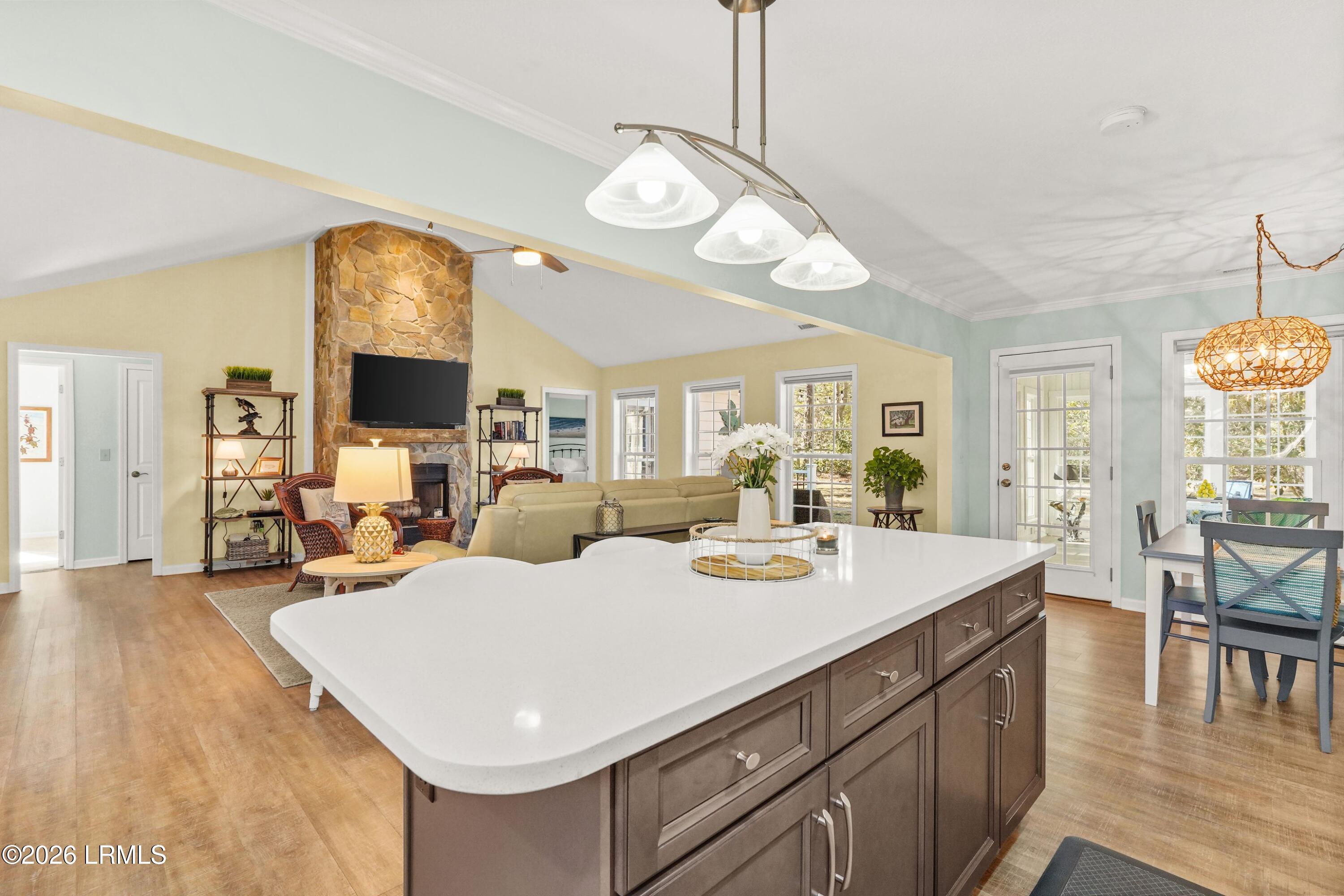 561 Sams Point Road Beaufort, SC 29907 - Photo 15 of 44 LIVING AREA AND KITCHEN ISLAND