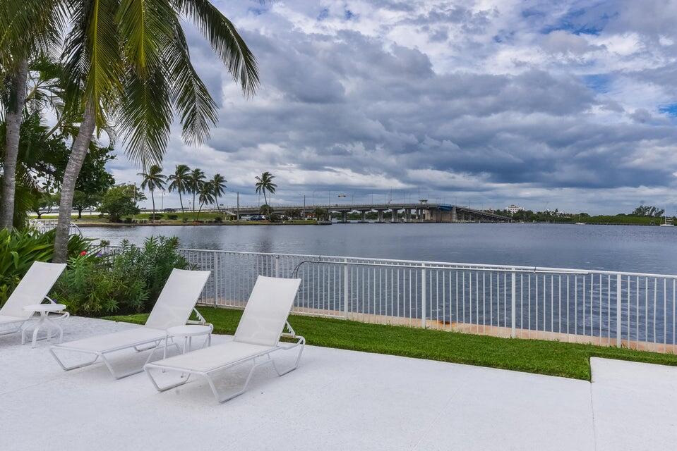 2860 South Ocean Boulevard, Unit 202 Palm Beach, FL 33480 - Photo 21 of 33 a view of a garden with lounge chair