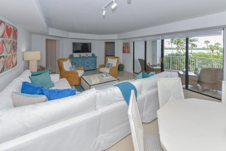 2860 South Ocean Boulevard, Unit 202 Palm Beach, FL 33480 - Photo 4 of 33 a living room with furniture large window and wooden floor