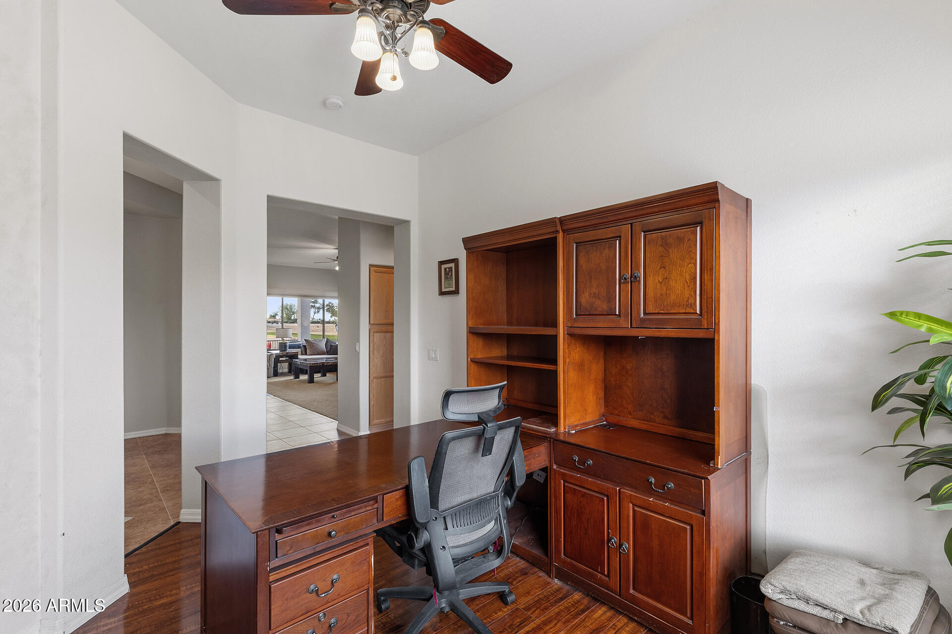 4906 South Verbena Avenue Gilbert, AZ 85298 - Photo 4 of 46 a view of workspace with furniture and wooden floor