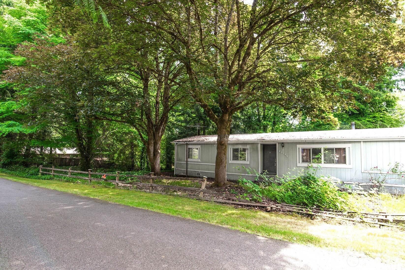 20115 49th Drive Southeast Bothell, WA 98012 - Photo 28 of 35 a front view of house with yard and green space