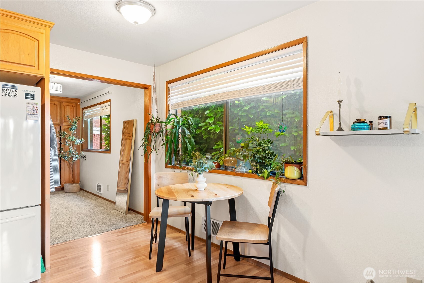 2619 Rucker Avenue, Unit 2 Everett, WA 98201 - Photo 9 of 33 a dining room with furniture and a floor to ceiling window