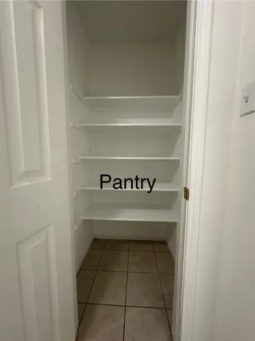 a bathroom with a sink a mirror and a shower