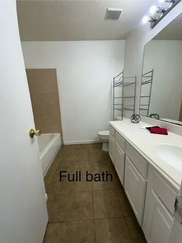 a view of balcony with furniture