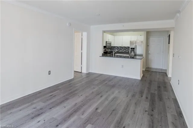 a hallway with wooden floor