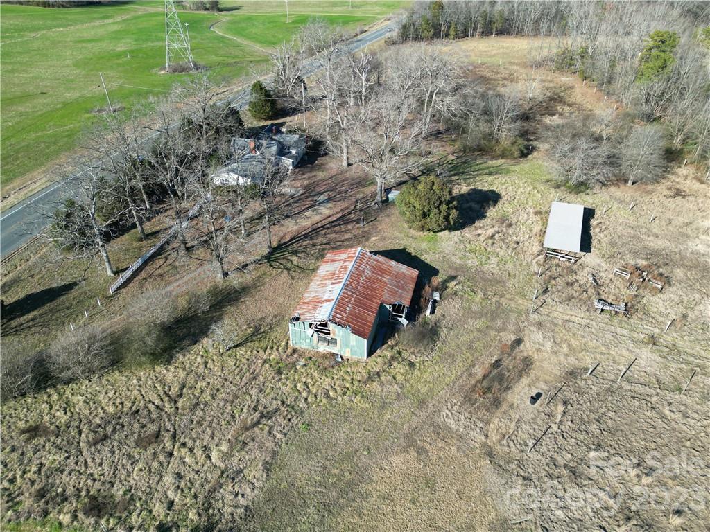 6508 Concord Highway Monroe, NC 28110 - Photo 3 of 9 a backyard of a house with a yard and outdoor seating