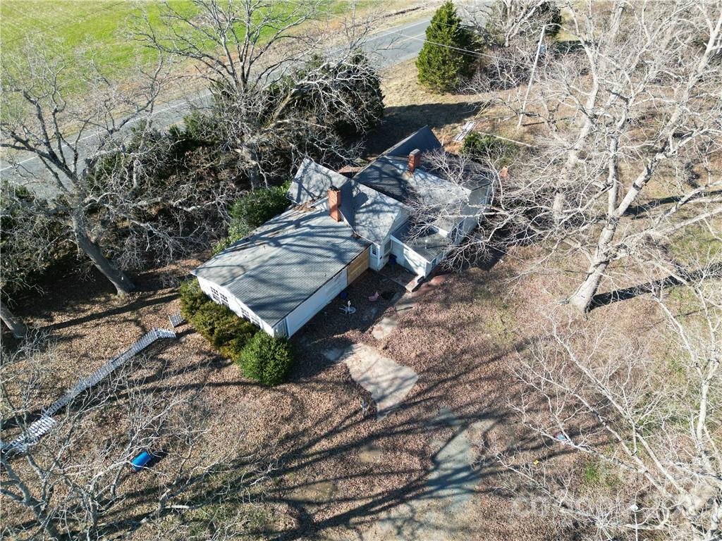 6508 Concord Highway Monroe, NC 28110 - Photo 5 of 9 a view of a yard with plants and large trees
