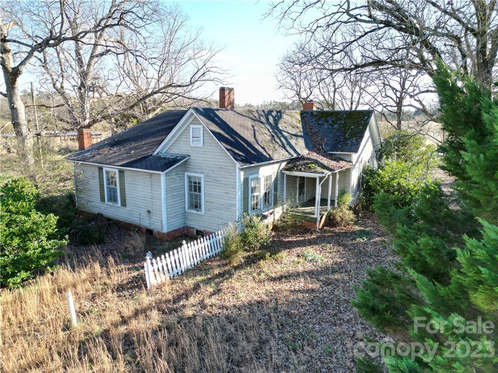 6508 Concord Highway Monroe, NC 28110 - Photo 6 of 9 a front view of a house with a yard