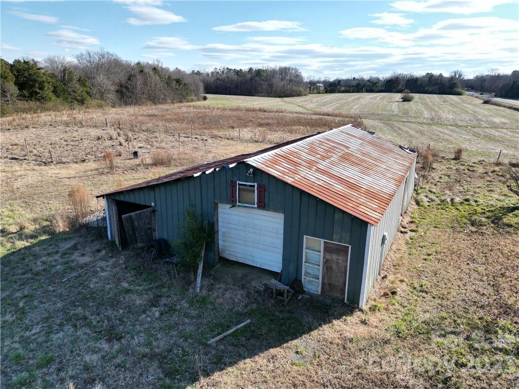 6508 Concord Highway Monroe, NC 28110 - Photo 8 of 9 a view of a house with a yard