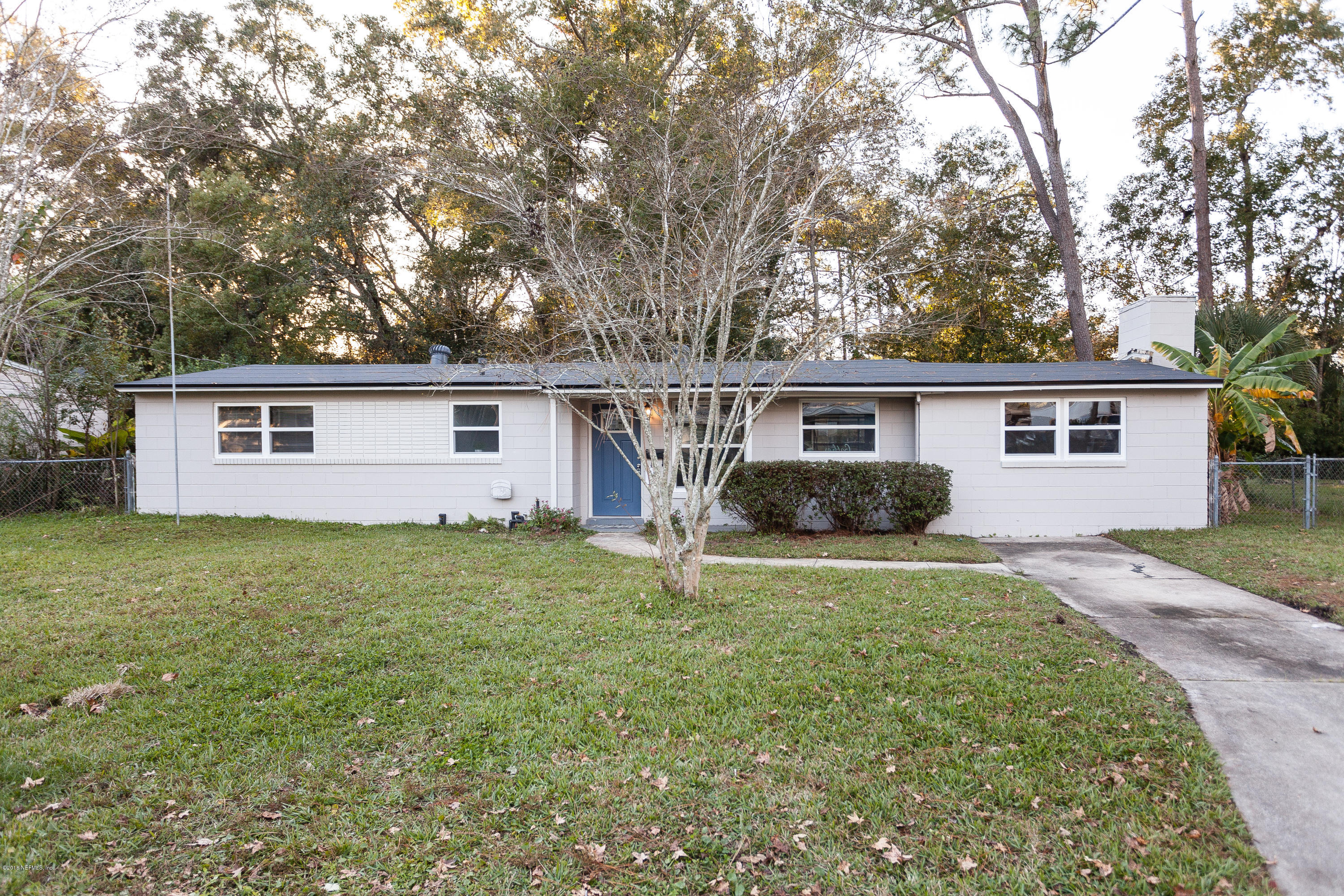 4230 Springwood Road Jacksonville, FL 32207 - Photo 1 of 20 front view of a house with yard