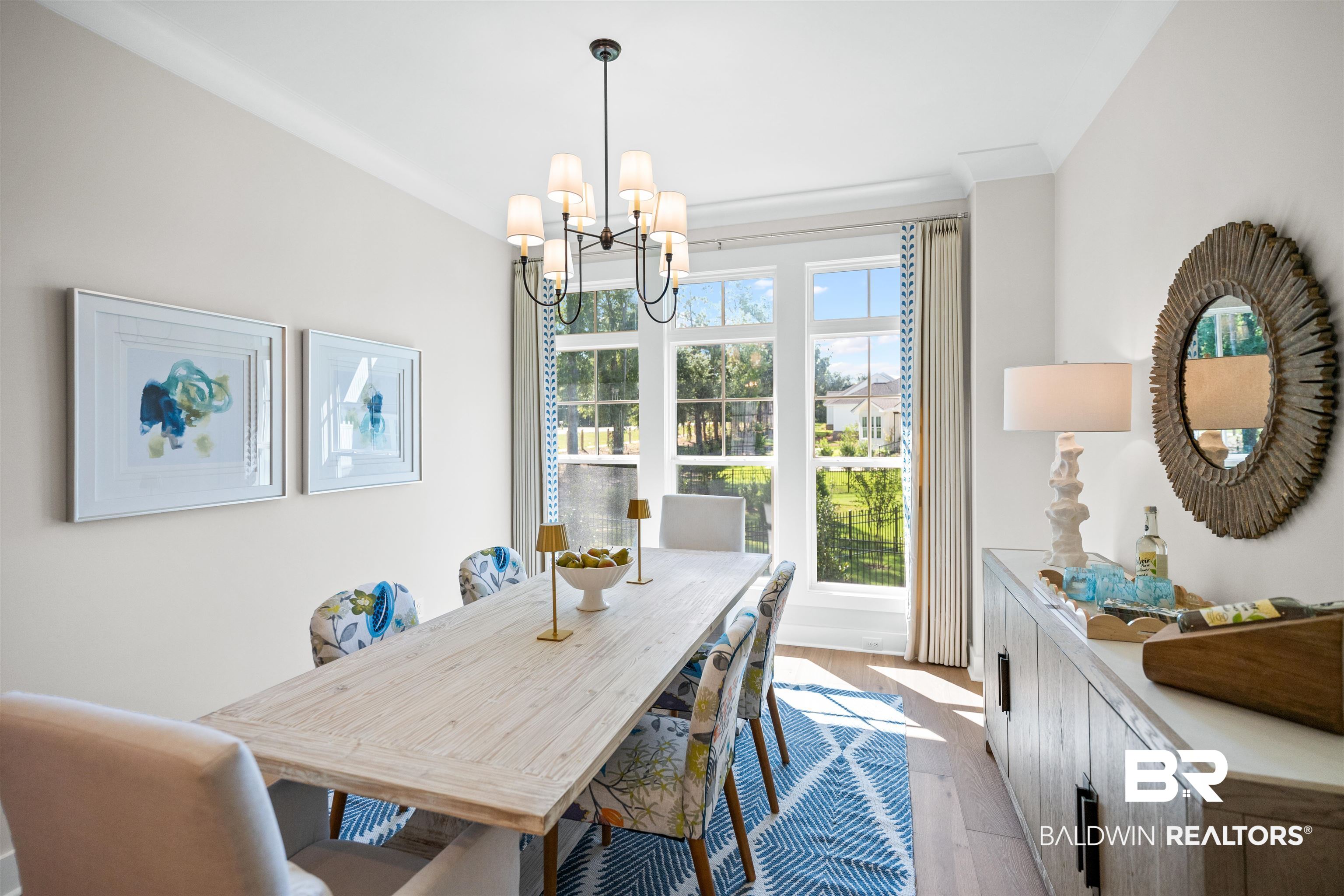 156 Hyacinth Street Fairhope, AL 36532 - Photo 24 of 61 Dining space with light wood-type flooring and a chandelier