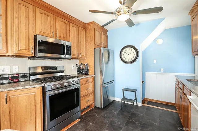 a kitchen with a stove and a microwave