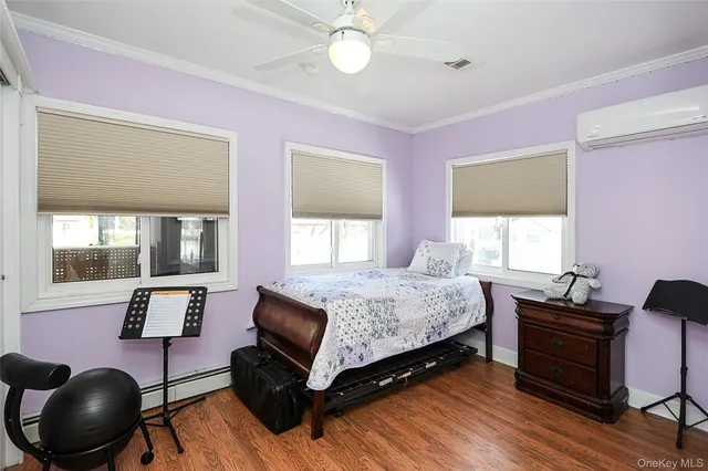 a bedroom with a bed and a chair