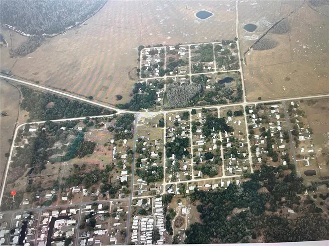 a view of building with glass windows