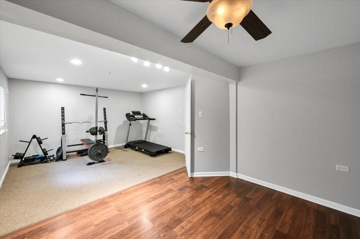 322 Zinnia Drive Romeoville, IL 60446 - Photo 29 of 42 a view of a room with gym equipment