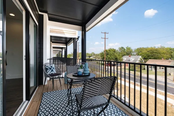 a view of sitting area with furniture and city view