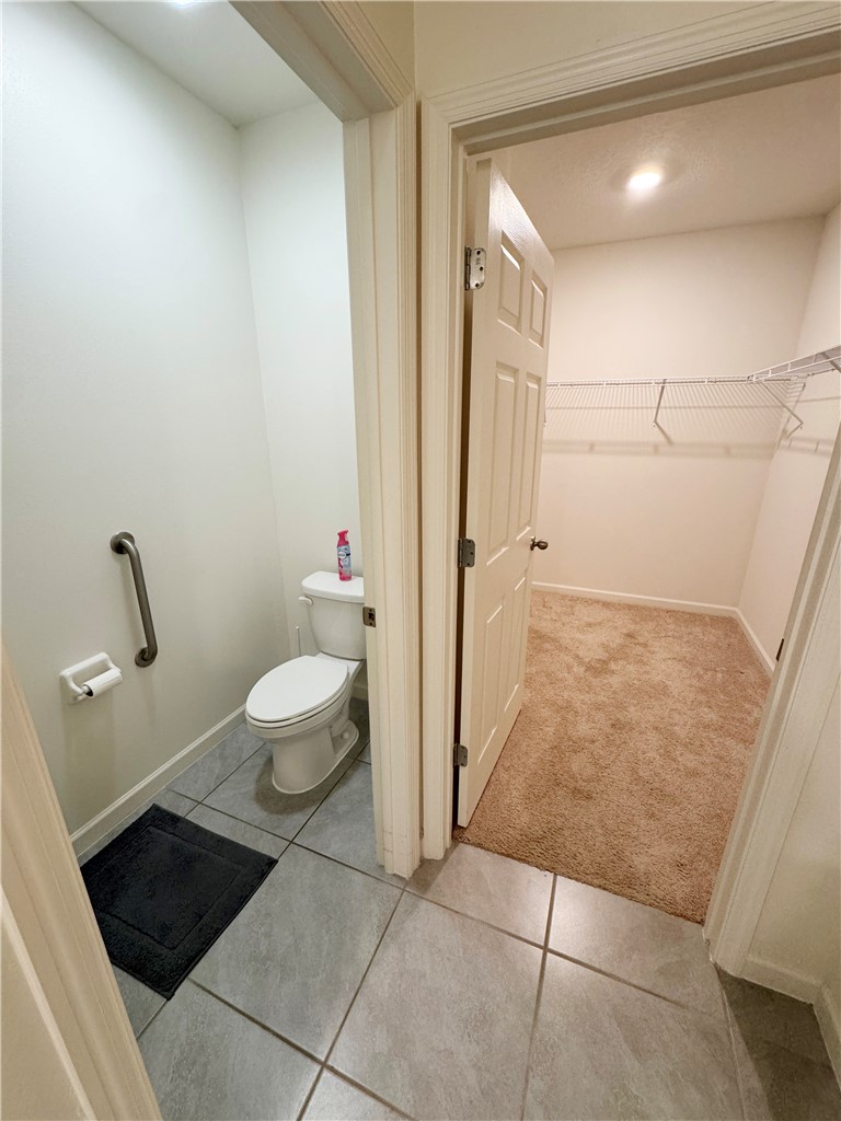 1836 Barber Street Sebastian, FL 32958 - Photo 26 of 29 a bathroom with a toilet and a shower