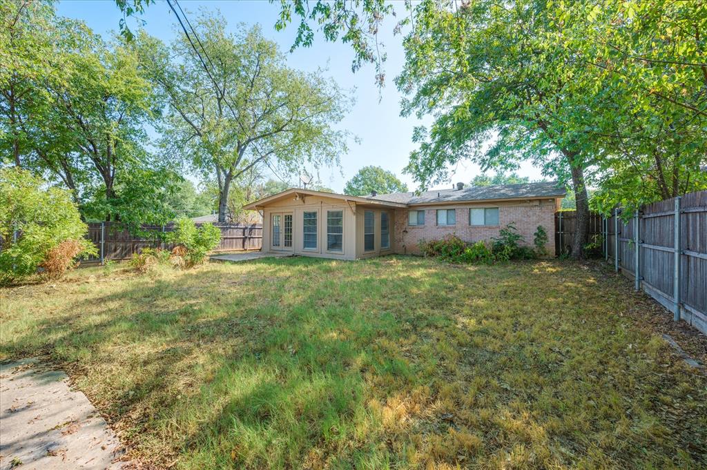 1902 Alan-A-Dale Road Arlington, TX 76013 - Photo 28 of 28 a view of a house with yard and a garden