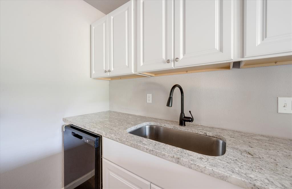 1902 Alan-A-Dale Road Arlington, TX 76013 - Photo 9 of 28 a close view of sink and tap