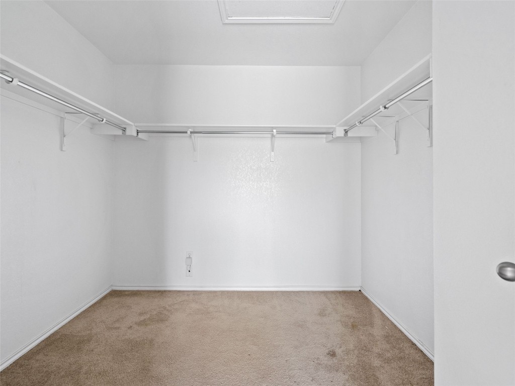7633 Rio Pass Austin, TX 78724 - Photo 14 of 23 Walk in closet with carpet