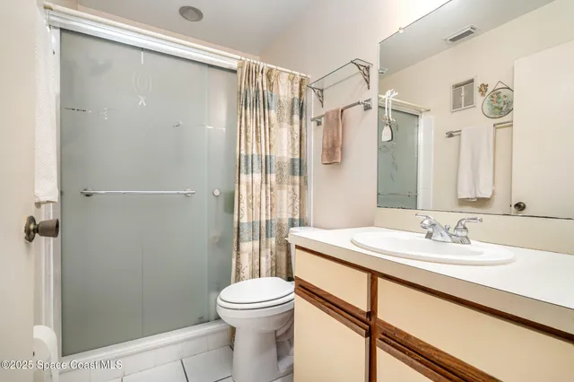 a bed room with furniture and a window