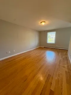 a view of a room with a furniture