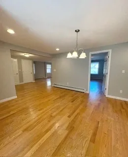 a kitchen with granite countertop cabinets and white appliances
