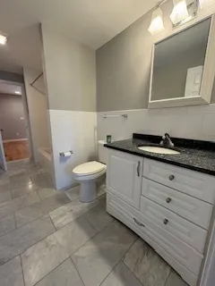 a view of a building with a yard