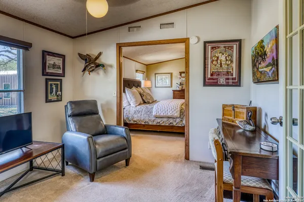 a bedroom with furniture and a couch