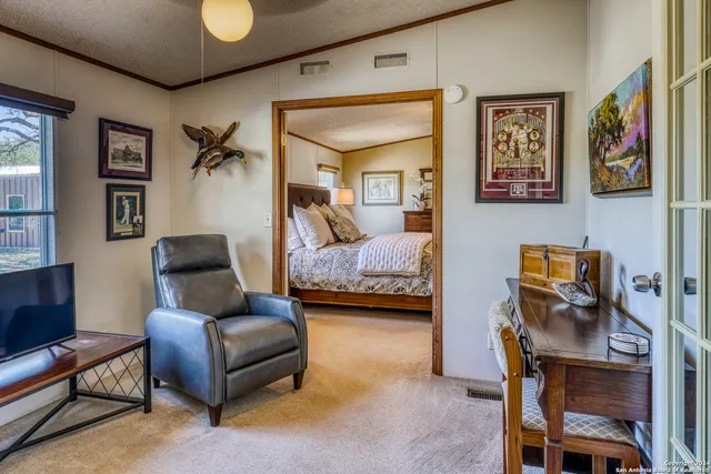 a bedroom with furniture and a couch