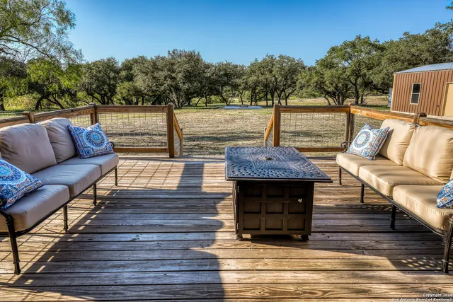 a view of a couches on the roof deck
