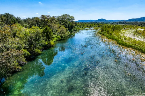 a view of a town with mountains in the background