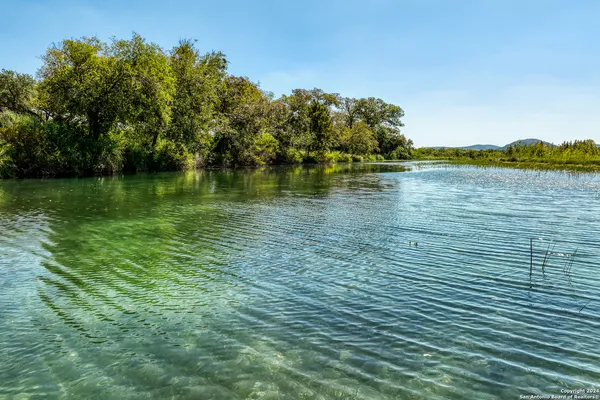 a view of a lake with mountains in the background