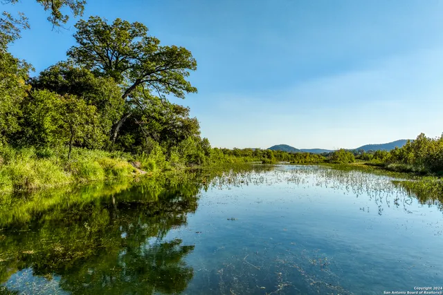 an aerial view of residential houses and outdoor space