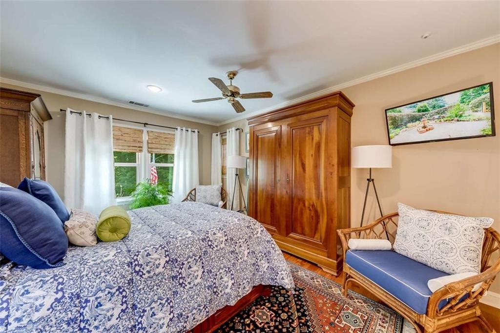 6180 Old Jefferson Road Athens, GA 30607 - Photo 52 of 95 a bed room with a bed and a couch