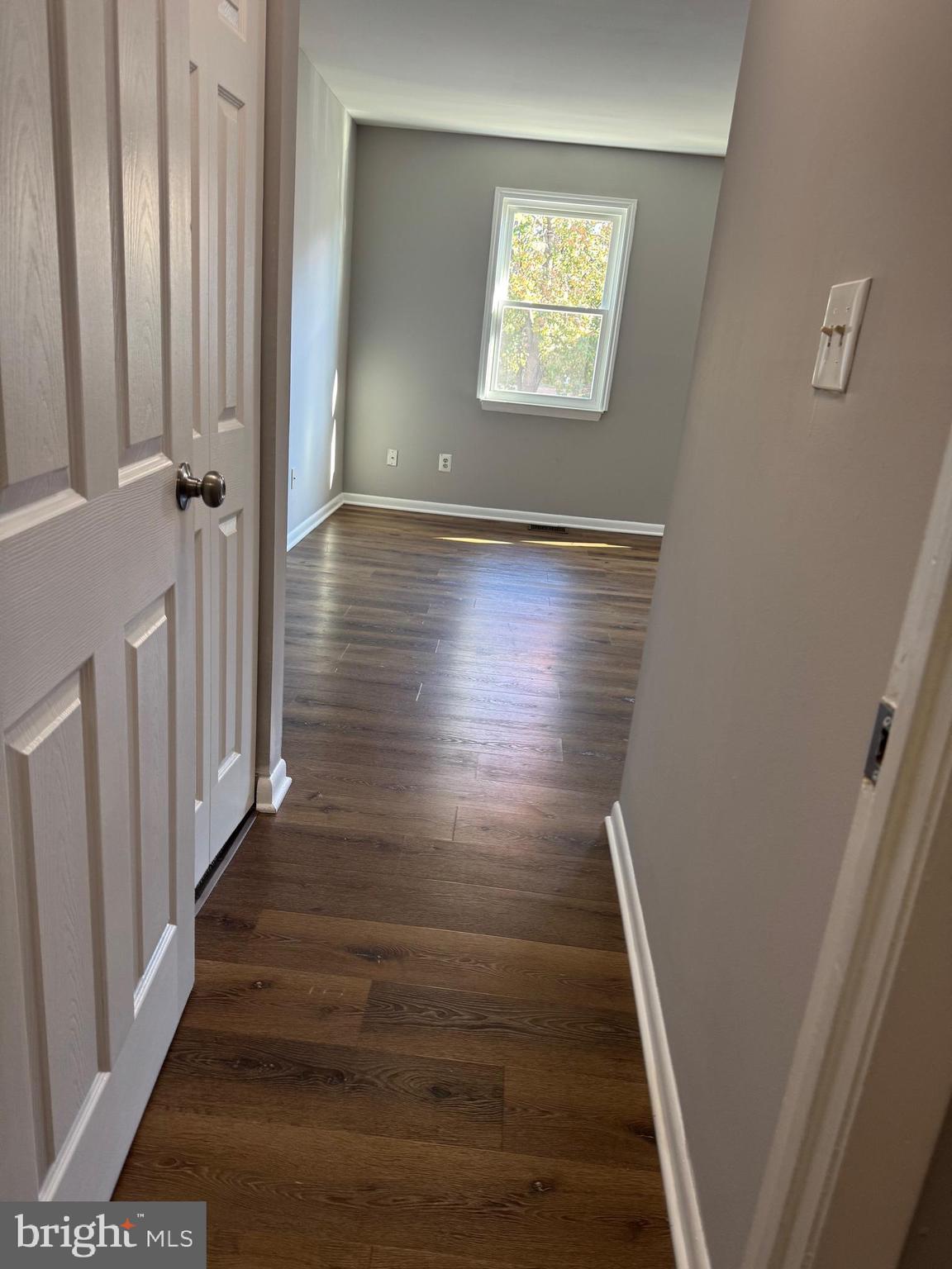 19970 Appledowre Circle, Unit 404 Germantown, MD 20876 - Photo 9 of 15 a view of an entryway with wooden floor