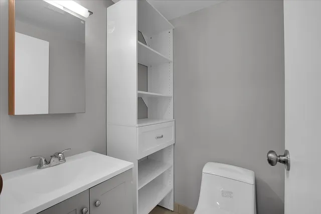 a view of an empty walk in closet