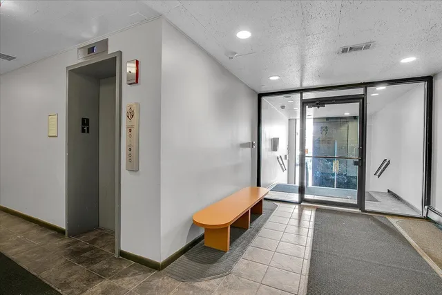 a view of a building with a street