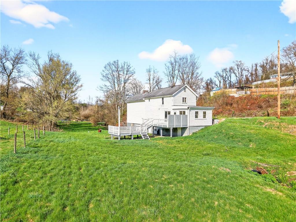 93 Old 51 Road Perryopolis, PA 15473 - Photo 37 of 44 a view of a house with a yard