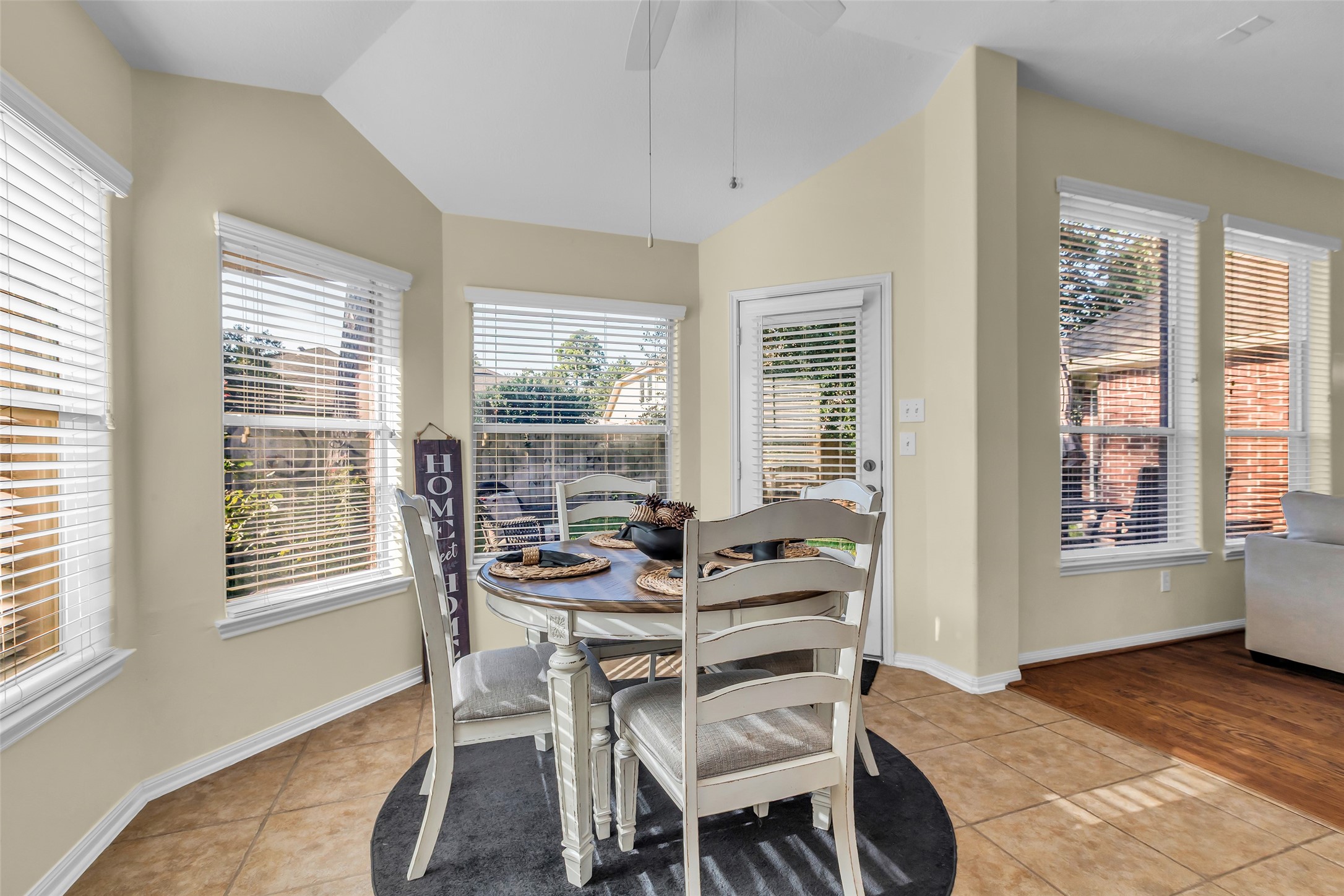 6311 Stone Hill Road Spring, TX 77389 - Photo 11 of 26 a dining room with furniture and windows