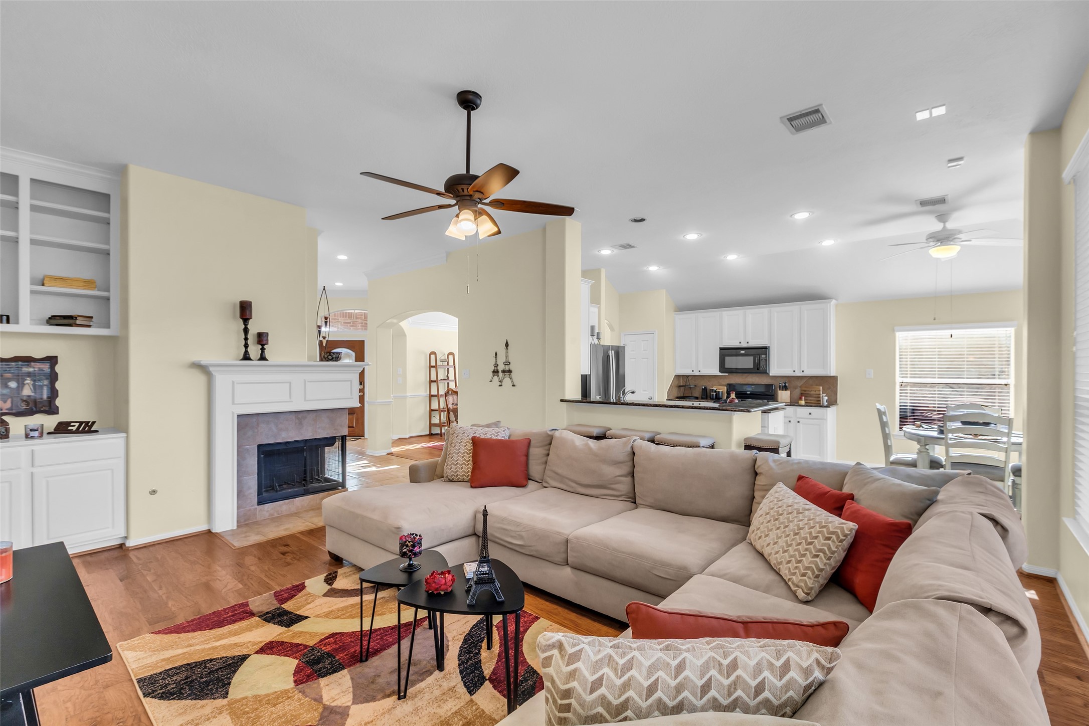 6311 Stone Hill Road Spring, TX 77389 - Photo 13 of 26 a living room with furniture and a fireplace
